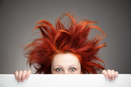 Redhead woman having a bad hair day and looking for help to have her best year ever. 